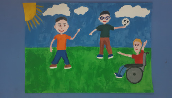 rysunek dzieci niepełnosprawny gra łąka